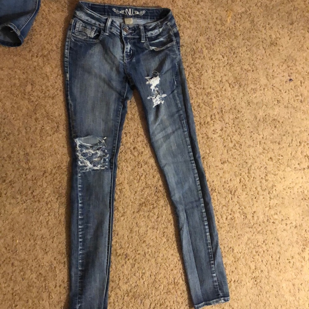 Two pairs of blue jeans